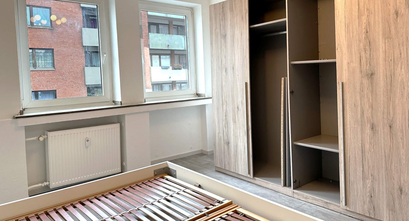 Schlafzimmer in möblierter Wohnung Aachen auf der Peliserkerstraße über Koch Immobilien GmbH