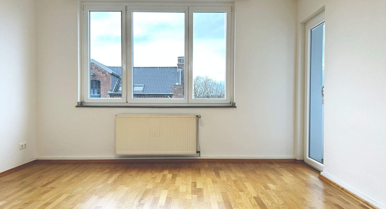 Wohnzimmer in Wohnung auf dem Karlsgraben in Aachen über Koch Immobilien zu vermieten!